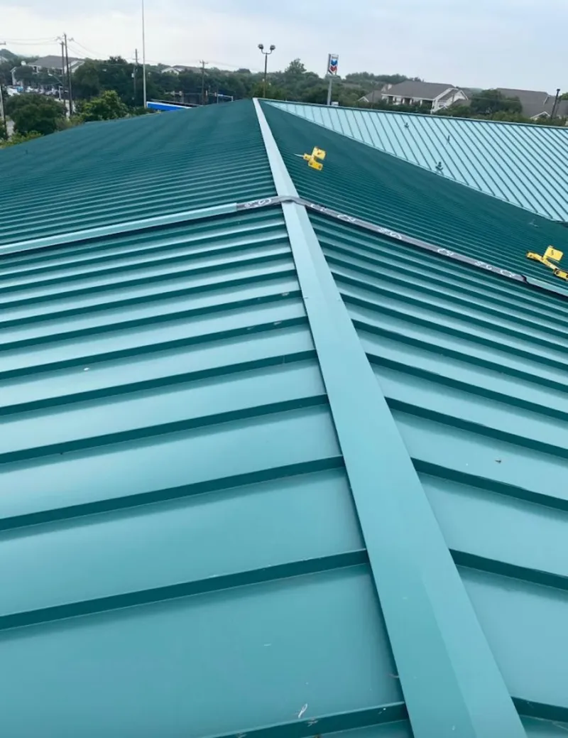 Green commercial metal roof ridge and valley for Metal Roof Repair in Hillsboro